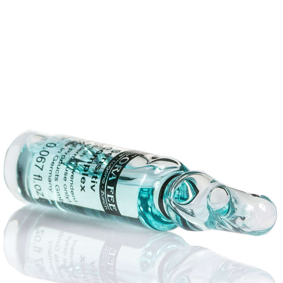 Cora Fee Sensitiv Complex Ampulle im Detail, klarer Ampullenboden und blaues Füllfläschchen
