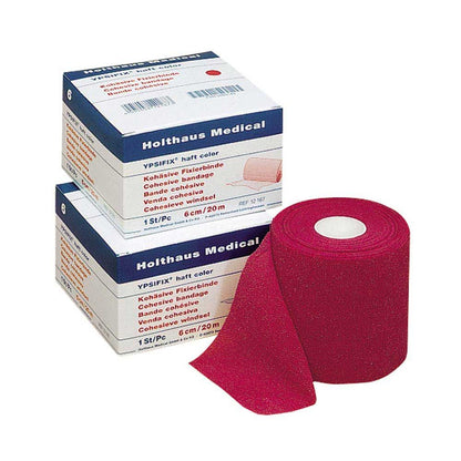 Pinkfarbene YPSIFIX® Fixierbinde haftend: Bandrolle und Packungsstapel