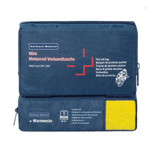 Blaue Mini-Motorrad-Verbandtasche mit gelber Warnweste, geöffnet
