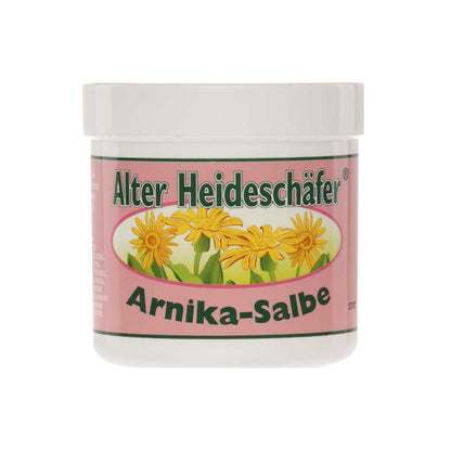 Alter Heideschäfer® Arnika-Salbe im weißen Kunststoffglas mit Deckel, pinkes Etikett vorne