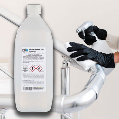 1-l Desinfektionsmittel-Flasche; schwarze Handschuhe sprühen auf die Arbeitsfläche