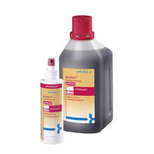 Gefärbtes Hautantiseptikum-Spray in Flasche, mit rotem Sprühkopf