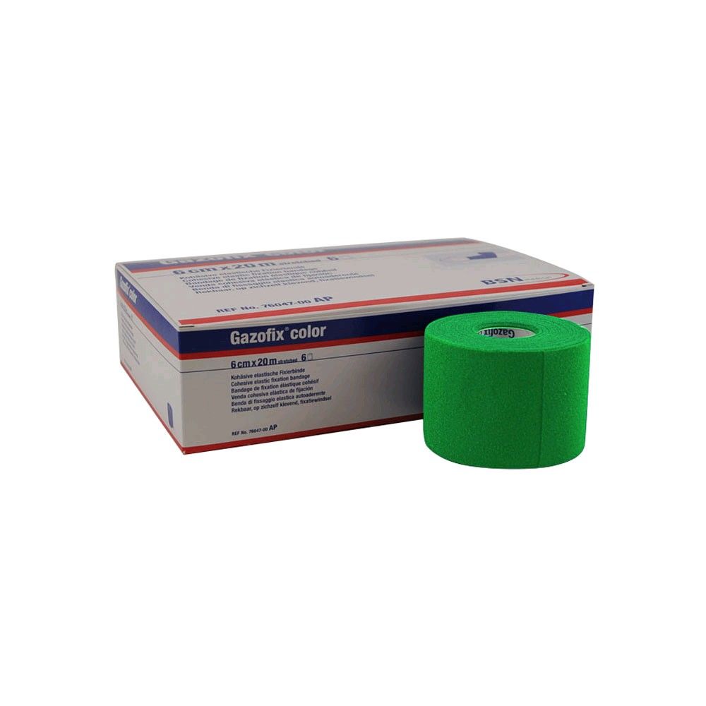 Fixierbinde-Rolle Gazofix color in Grün, neben der Verpackung